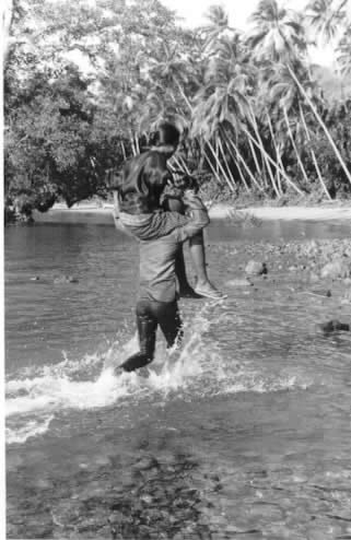 Women being carried ashore.